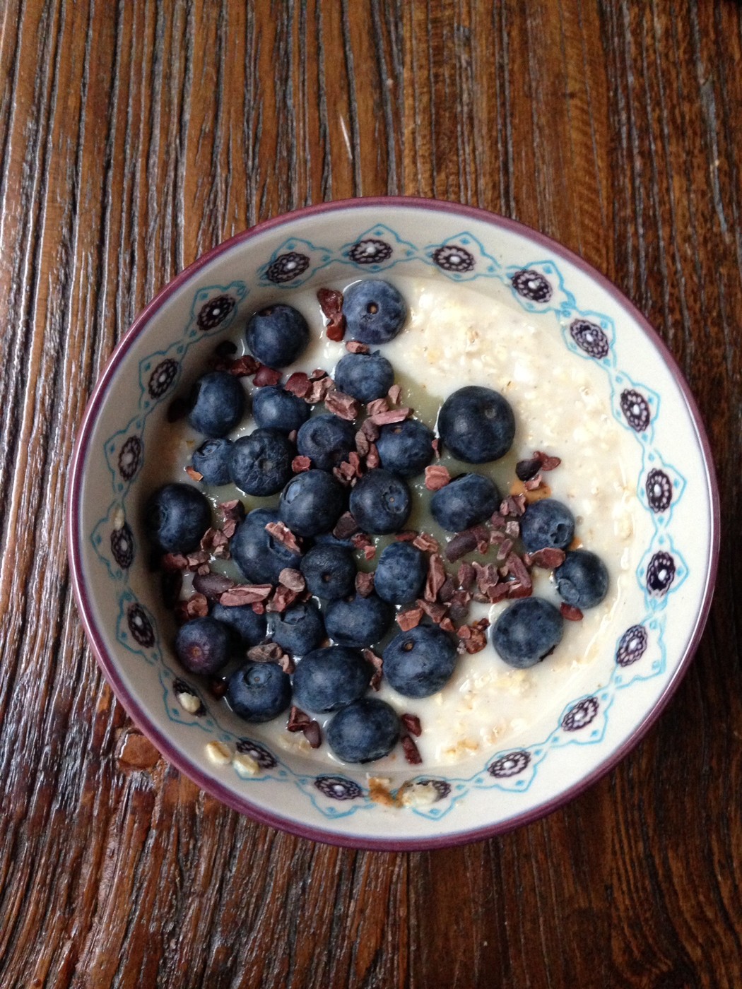 Oats with coconut, blueberries and apple puree