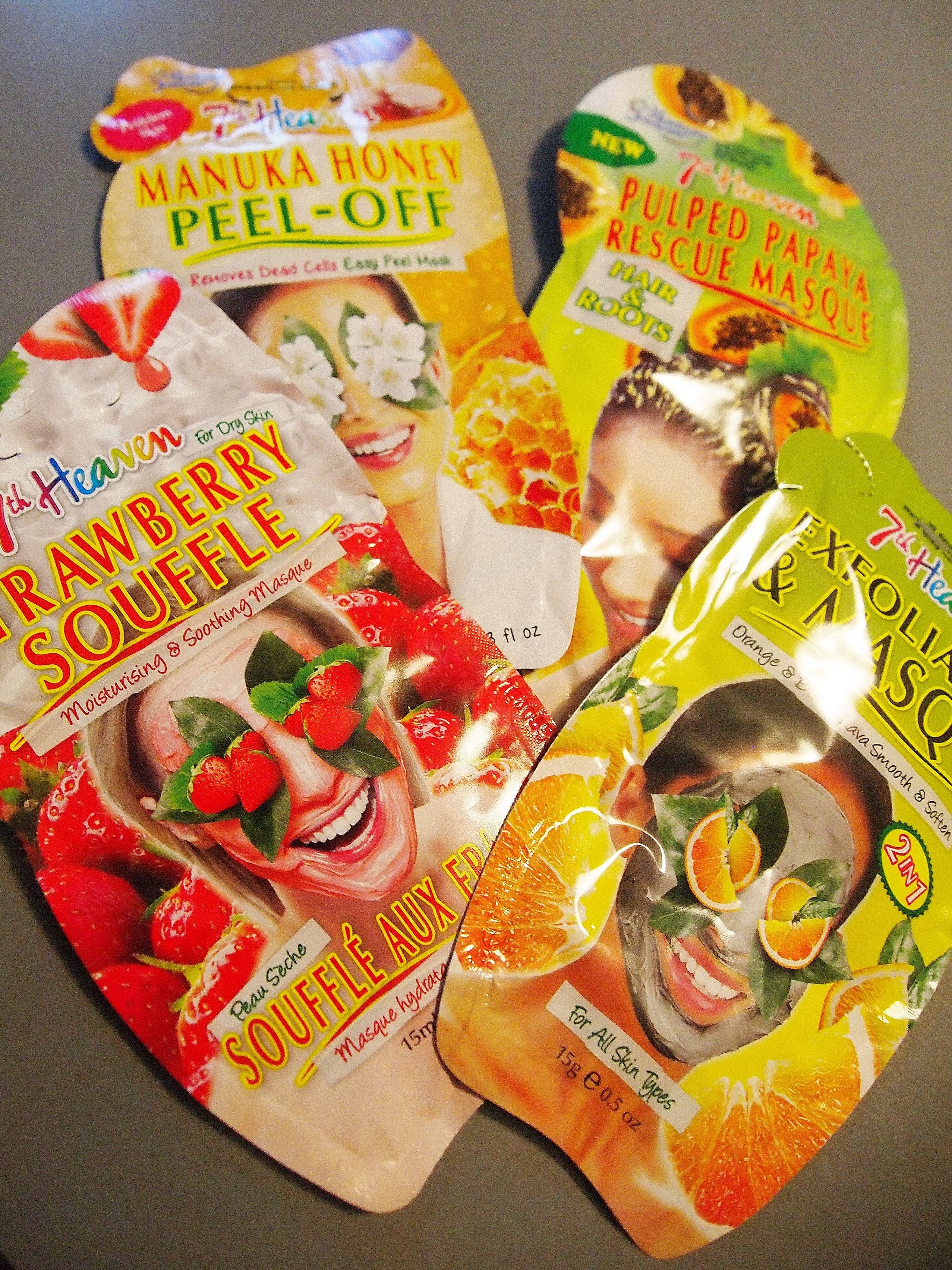 7th Heaven masks Orange & Black Lava Exfoliator mask, Manuka Honey Peel-Off Mask, Strawberry Souffle mask, Pulped Papaya Rescue Hair Mask